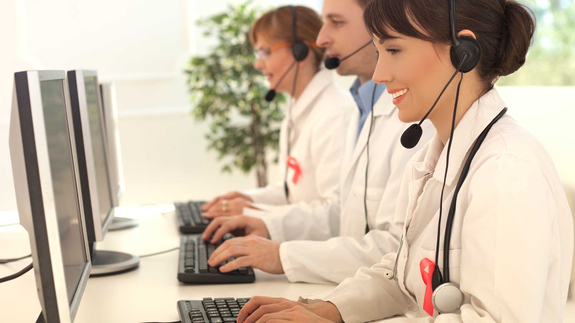 healthcare providers making call on computers