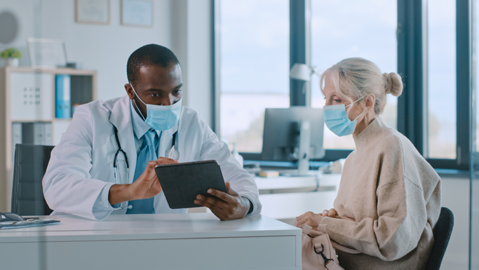 physician and patient overcoming prior authorization hurdles with technology 