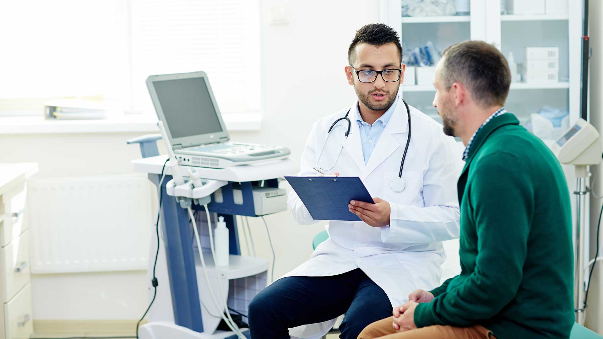 doctor and male patient in healthcare setting