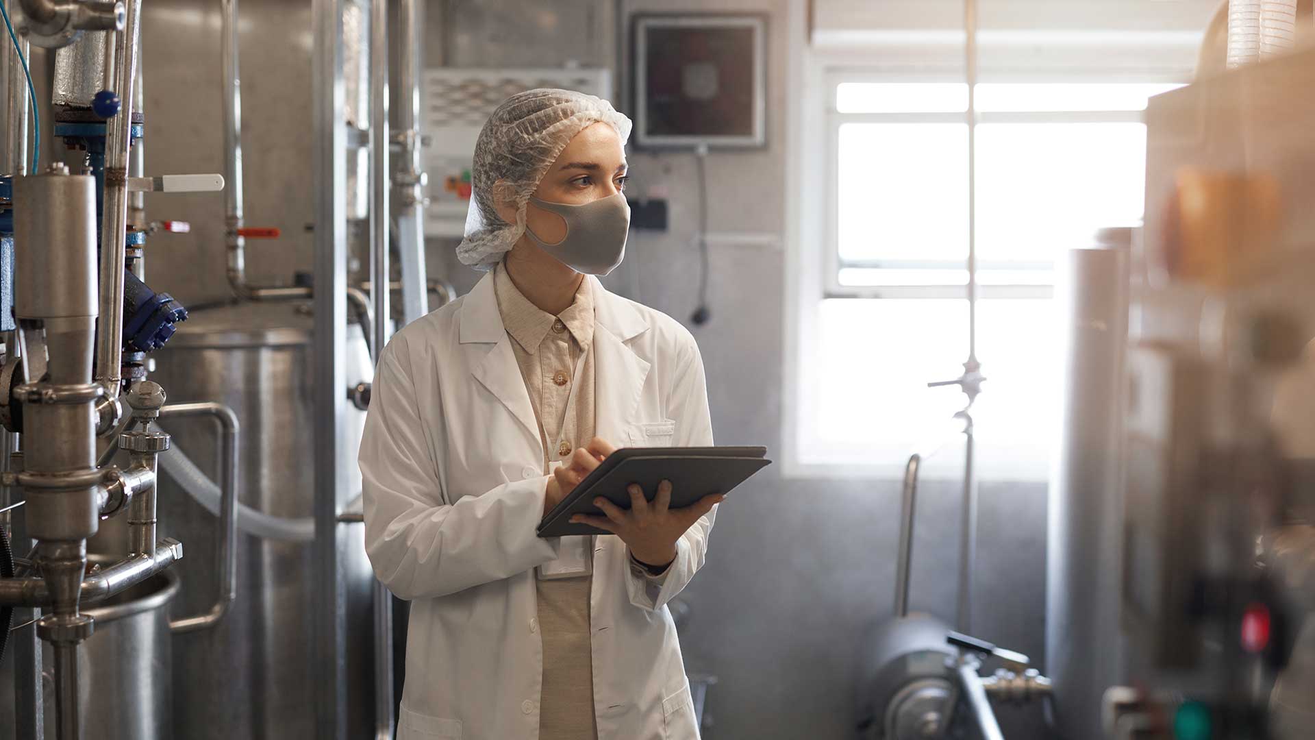 female scientist in a manufacturing facility